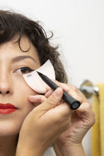 Load image into Gallery viewer, Girl using shadowmoon reusable shadow shields to apply eyeliner
